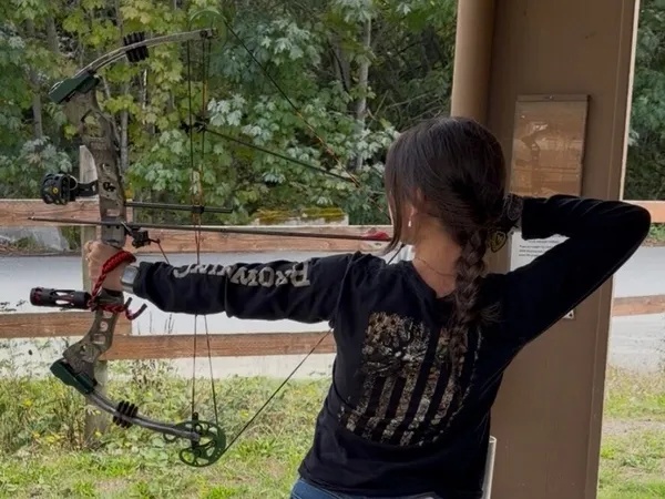 Archer at full draw on an outdoor range near Sultan, Washington